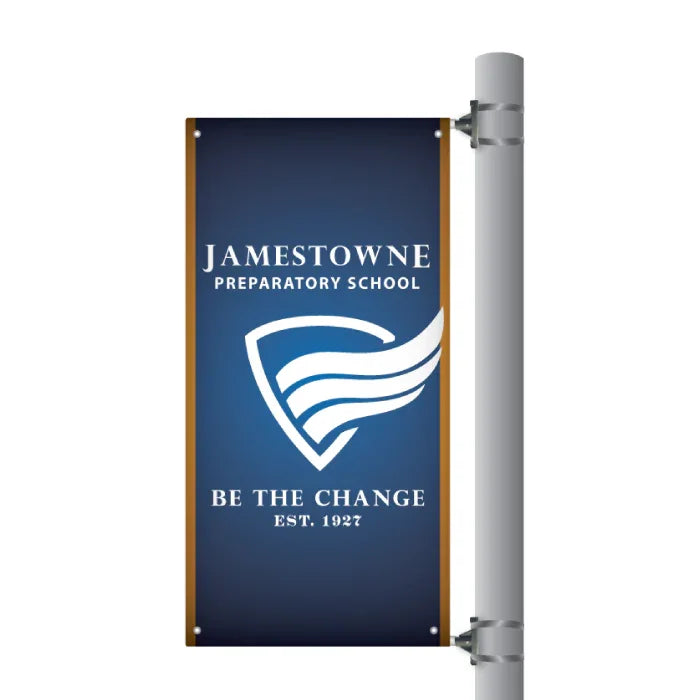 Graphic mockup of a navy blue Jamestowne Preparatory School branding boulevard pole banner mounted to a metallic post.