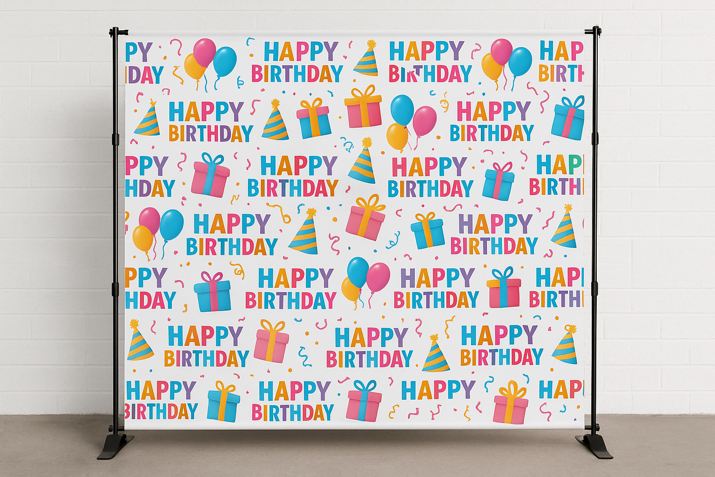 Birthday-themed backdrop with colorful text and graphics on a white background