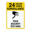 A rectangular yellow and white sign with rounded corners featuring the text '24 HOUR VIDEO SURVEILLANCE' in black, a black security camera icon, and 'YOUR SECURITY TEXT HERE' on a white background.