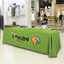 Extra large green 8-foot table throw with custom business logo for professional exhibition booths.