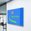 Custom full color blue acrylic business sign with travel agency logo.