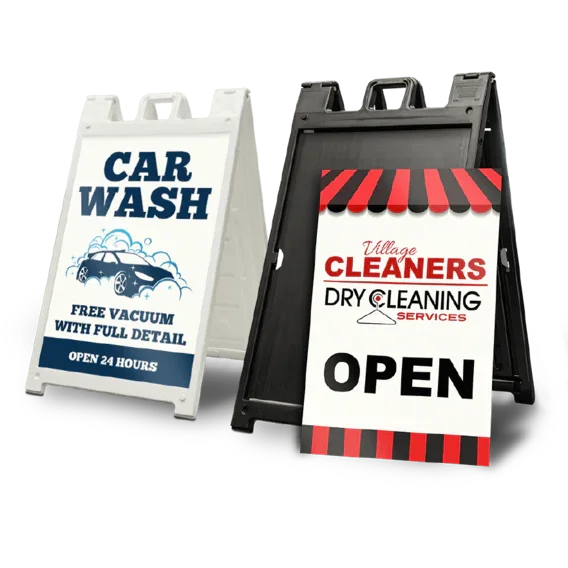 Two portable plastic A-frame signs for business, one white car wash sign and one black dry cleaners open sign.