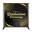 Graduation ceremony backdrop with gold text on a black background