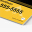 Close up of a custom yellow corrugated plastic yard sign with black text and fluted ridges.