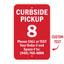 Red numbered curbside pickup parking sign displaying space 8 with call or text instructions for customers collecting online orders.