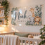 Custom clear acrylic nursery name sign featuring the name "Noah James" in bold navy typography surrounded by woodland safari illustrations including a cute giraffe, lion, and elephant, mounted on a white wall above a crib.