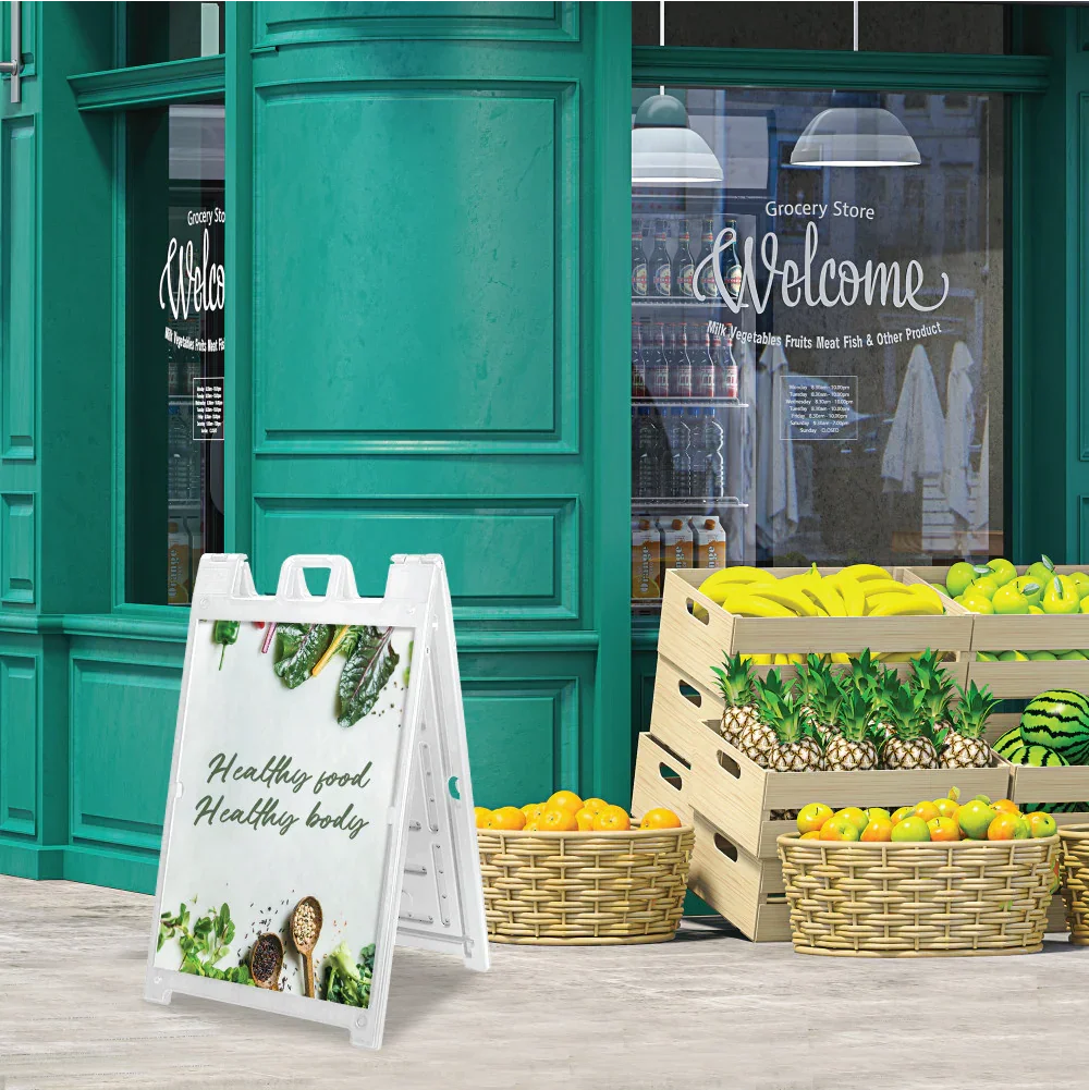 Custom white signicade sidewalk sign displayed outside a flower shop storefront to attract local customer foot traffic.