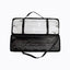 Black complimentary carrying case open with packed interlocking aluminum tube frame components for a tension fabric stand display